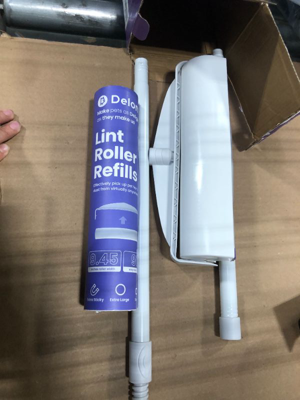 Photo 1 of ***MISSING PARTS*** Large Lint Rollers for Carpet, Sticky Rollers for Floor DELOMO 9.45 in with 3 Extendable Handle, Long Handle Sticky Mop for Cleaning Carpets, Cars, Clothing, and Pet Hair