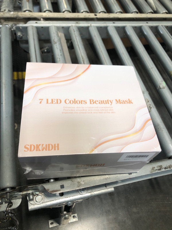 Photo 1 of ***FACTORY SEALED*** SDKWDH Red Light Therapy Mask for Face, Led Face Mask Light Therapy, 7 Colors LED Facial Skin Care at Home, Gold