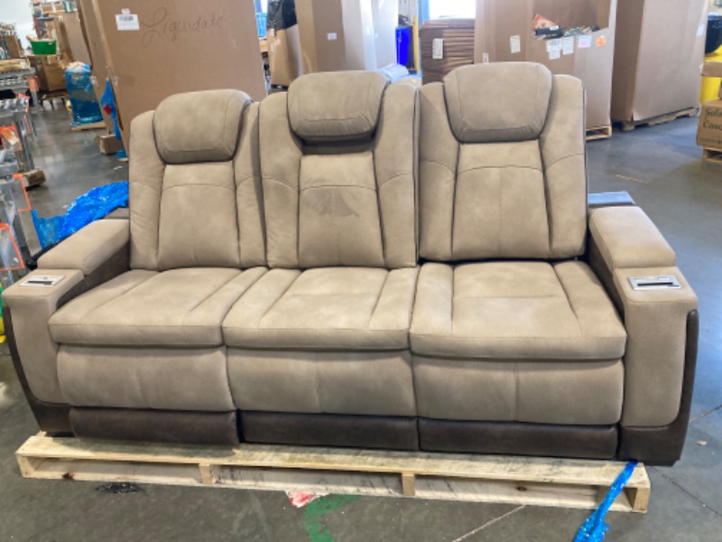 Photo 1 of ***MAY NEED A TRUCK***IT'S A LITTLE DIRTY, IT NEEDS TO BE CLEANED***Signature Design by Ashley Next-Gen DuraPella Power Reclining Sofa – Wireless & USB Charging, Zero-Gravity, Water-Repellent Faux Leather, Tan/Brown