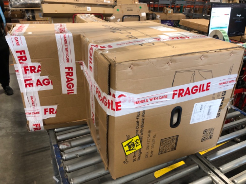 Photo 1 of ***** MISSING WATER TANK LID **** Swiss Madison St. Tropez SM-1T254HB One-Piece Elongated Toilet Vortex Dual-Flush 1.1/1.6 gpf with Comfort Chair Seat ADA Height in Glossy White with Black Hardware