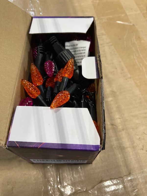 Photo 1 of ** SOME BULBS DAMAGED** WATERGLIDE Halloween C6 String Lights, 33ft 100 LED Black Wire Fairy Lights with 29V Safe Adaptor, 8 Lighting Mode, Waterproof for Indoor Outdoor Patio Xmas Tree Party Decor, Orange & Purple