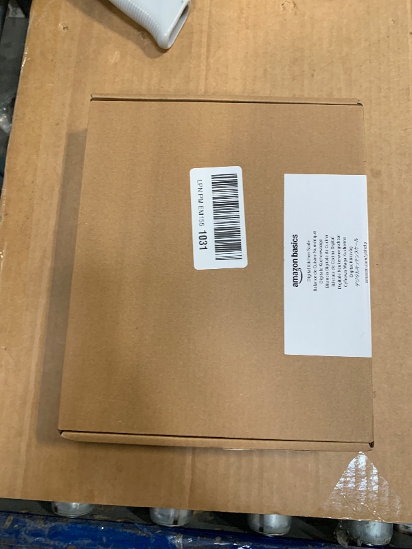 Photo 1 of Amazon Basics Digital Kitchen Scale with LCD Display, Batteries Included, Weighs up to 11 pounds, Black and Stainless Steel