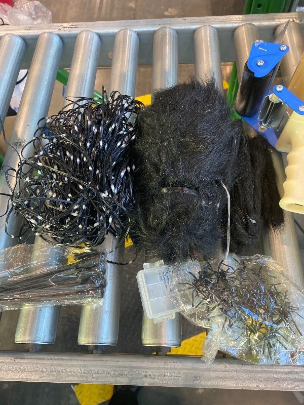 Photo 1 of **LIGHTS DO NOT WORK**PARTS ONLY***Halloween Decorations Outdoor Spider Web Lights - 16.4Ft Light Up Spider Web with 550 LEDs, Waterproof, 8 Modes Memory Function for Outdoor Yard Halloween Decorations (with Spider)