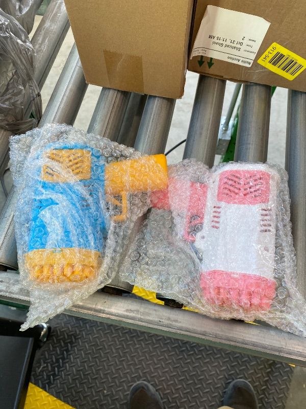 Photo 1 of ***MISSING PARTS*** LUSJNGE 2 Bubble Gun with 2 Bottles Refill Solution for Kids, 40-Hole Light Up Bubble Machine for Toddlers 1-3, Bubble Blaster Maker, Party Favors Toys for Boys Girls 4-8 Birthday Gifts