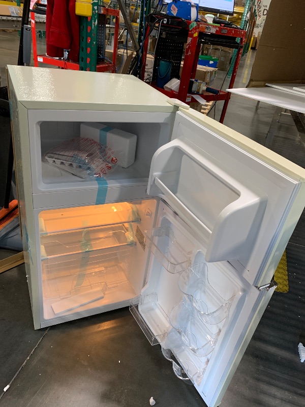 Photo 1 of *** NEW/ DAMAGE MINOR**** Frigidaire EFR840-Cream EFR840 Retro Mini Fridge with Freezer & Side Bottle Opener-Small 2 Door Refrigerator for Office Bar or College Dorm Room-3.1 Cu Ft (Cream)