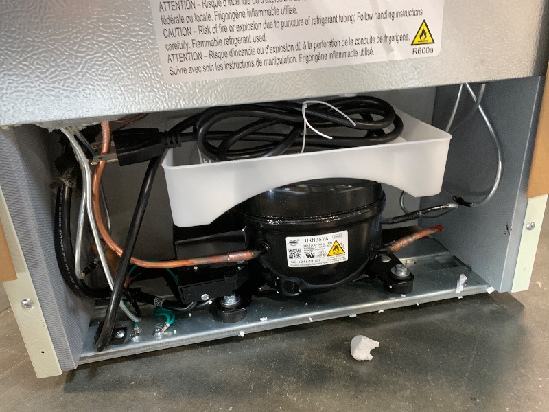 Photo 1 of *** NEW/ DAMAGE MINOR**** Frigidaire EFR840-Cream EFR840 Retro Mini Fridge with Freezer & Side Bottle Opener-Small 2 Door Refrigerator for Office Bar or College Dorm Room-3.1 Cu Ft (Cream)