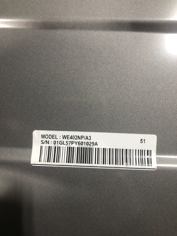 Photo 1 of ***MINOR DENT ON TOP, PICTURED*** SAMSUNG 27-Inch Washer Dryer Pedestal Stand w/ Pull Out Laundry Storage Drawer, Stainless Steel, WE402NP/A3, Platinum