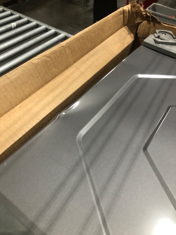 Photo 1 of ***MINOR DENT ON TOP, PICTURED*** SAMSUNG 27-Inch Washer Dryer Pedestal Stand w/ Pull Out Laundry Storage Drawer, Stainless Steel, WE402NP/A3, Platinum