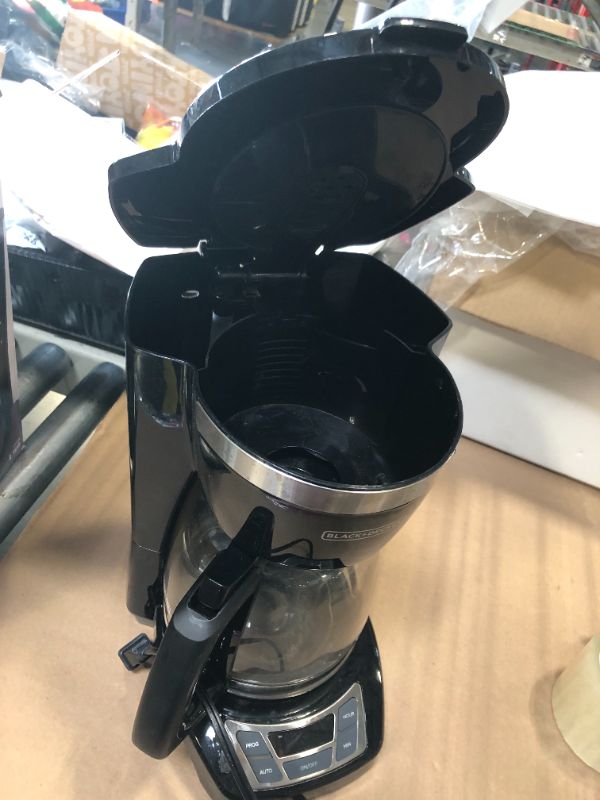 Photo 1 of ***VERY USED*** BLACK+DECKER 12-Cup Digital Coffee Maker, Programmable, Washable Basket Filter, Sneak-A-Cup, Auto Brew, Water Window, Keep Hot Plate, Black