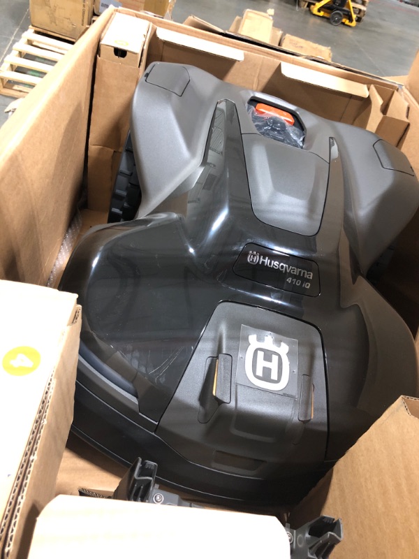 Photo 1 of ** BRAND NEW ITEM / UNTESTED ** Husqvarna 410iQ Automower Robotic Mower, 0.5 Acre Mowing Capacity, Wire Free Robot Lawn Mower with Charging Station, RS1 EPOS Reference Station and Replacement Blades, 970727401