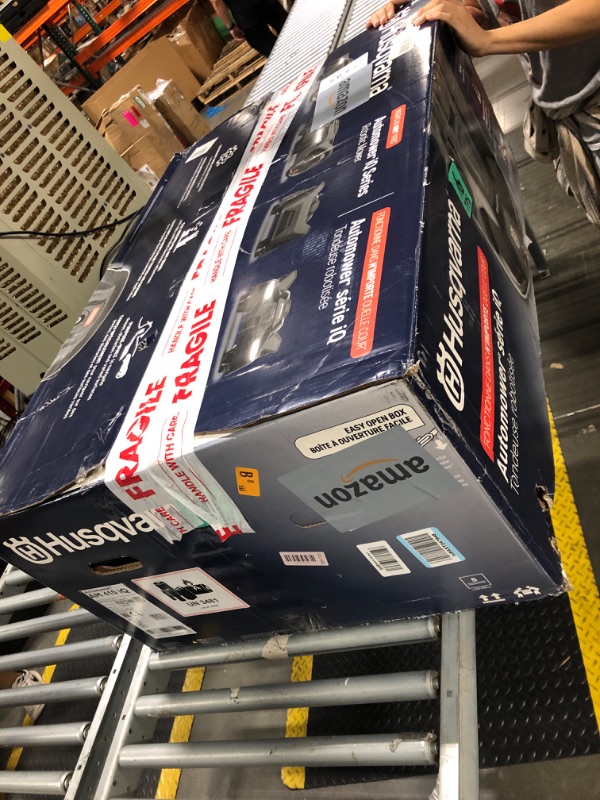 Photo 1 of ** BRAND NEW ITEM / UNTESTED ** Husqvarna 410iQ Automower Robotic Mower, 0.5 Acre Mowing Capacity, Wire Free Robot Lawn Mower with Charging Station, RS1 EPOS Reference Station and Replacement Blades, 970727401