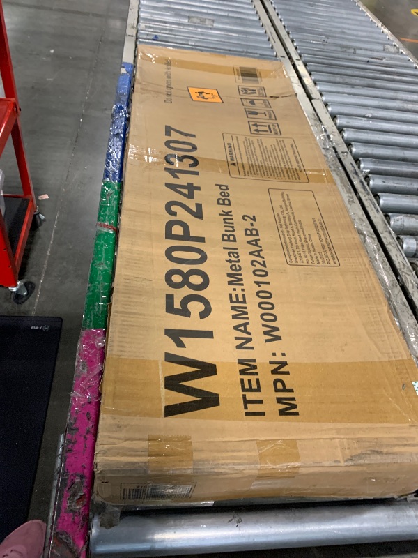 Photo 1 of *****MISSING PARTS******Bellemave Twin Size Triple Bunk Bed for 3 Kids, Heavy Duty Metal Triple Bunk Bed with Safety Fence, Heavy Duty Triple Beds for Kids, Teens, Black