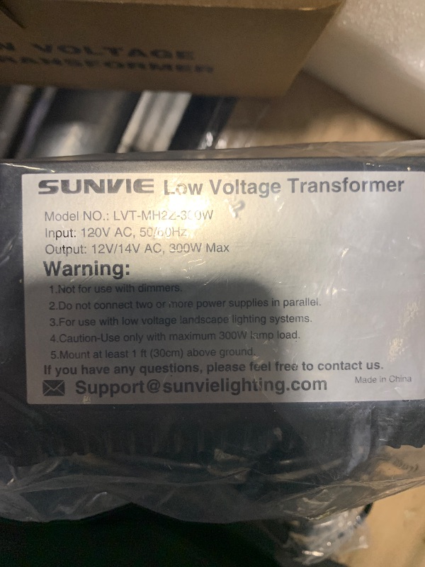 Photo 1 of *Damaged item scratched* SUNVIE 300W Low Voltage Landscape Transformer with 2 Independent Control Output Landscape Lighting Transformer with Timer and Photocell Sensor 120V AC to 12/14V AC Weatherproof Low Voltage Transformer
