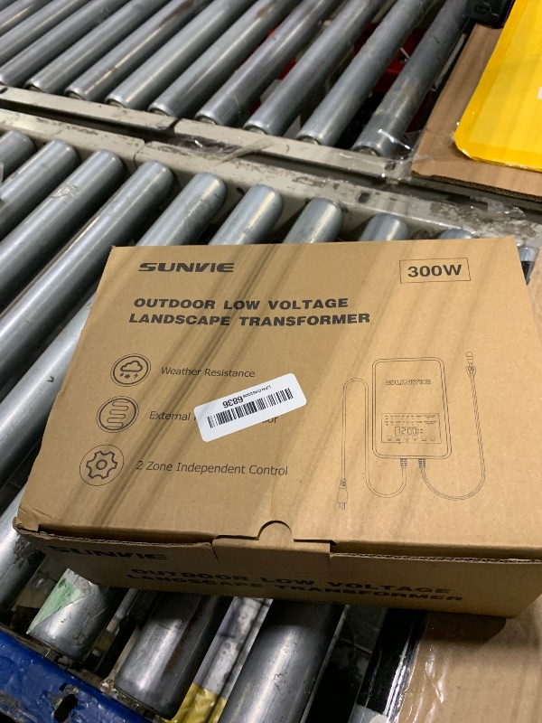 Photo 1 of *Damaged item scratched* SUNVIE 300W Low Voltage Landscape Transformer with 2 Independent Control Output Landscape Lighting Transformer with Timer and Photocell Sensor 120V AC to 12/14V AC Weatherproof Low Voltage Transformer