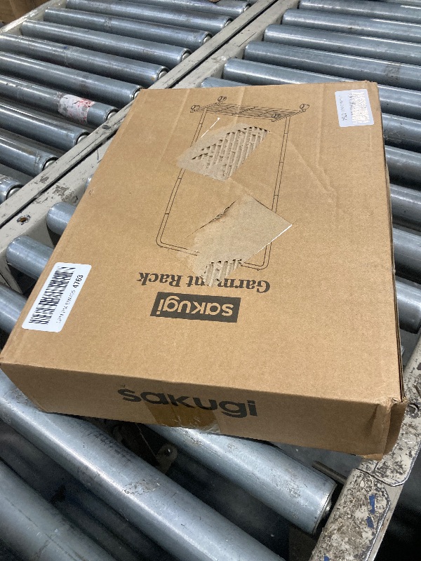 Photo 1 of Sakugi Clothes Rack - Clothing Rack with Storage Mesh Shelf & Casters, Heavy-Duty Metal Clothing Rack for Hanging Clothes, Dresses, Coats, Large Load Capacity, Easy Assembly, Black, 28.0"x16.9"x59.0"