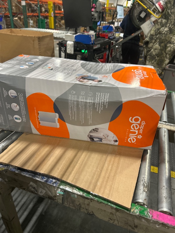 Photo 1 of *****DAMAGE****
Diaper Genie Platinum Pail Gift Set, Lily White, Made of Durable Stainless Steel and Includes 2 Easy Roll Refills with 18 Bags and 30 Bags