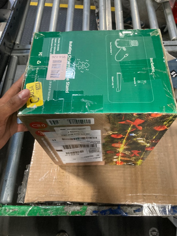 Photo 1 of ?Patent Pending? Musical Rotating Christmas Tree Stand, UL Certified Up to 9ft 120 lb Artificial Christmas Tree with Speaker, Spinning Stand with Remote, Fit for 1.25-2" in Tree Poles - 800W