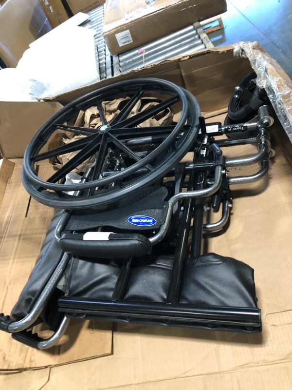 Photo 1 of ** VERY USED/ UNTESTED***Invacare Tracer IV Wheelchair for Adults | Manual Bariatric Folding Wheelchair | 22 Inch Seat | Desk Arms