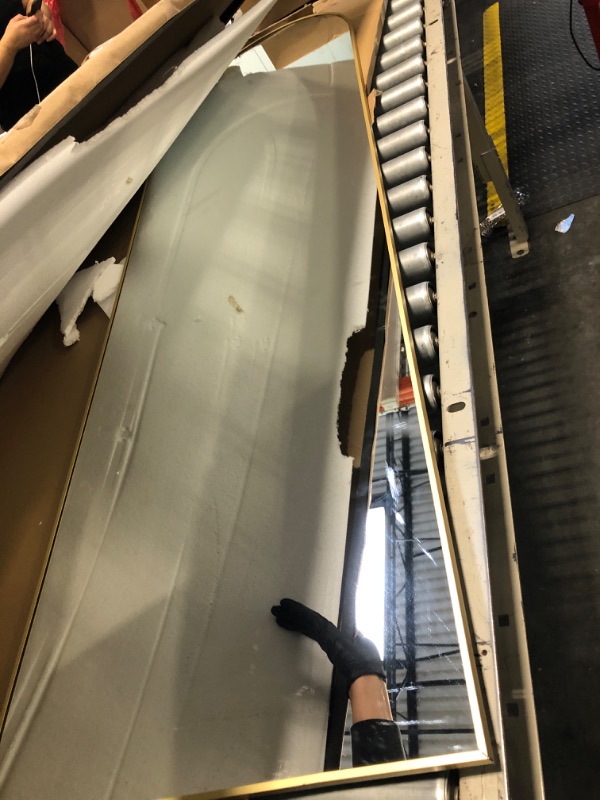 Photo 1 of ** used** HARRITPURE 64"x21" Arched Full Length Mirror Free Standing Leaning Hanging Mounted Mirror Aluminum Frame Modern Simple Home Decor for Living Room Bedroom Cloakroom, Gold