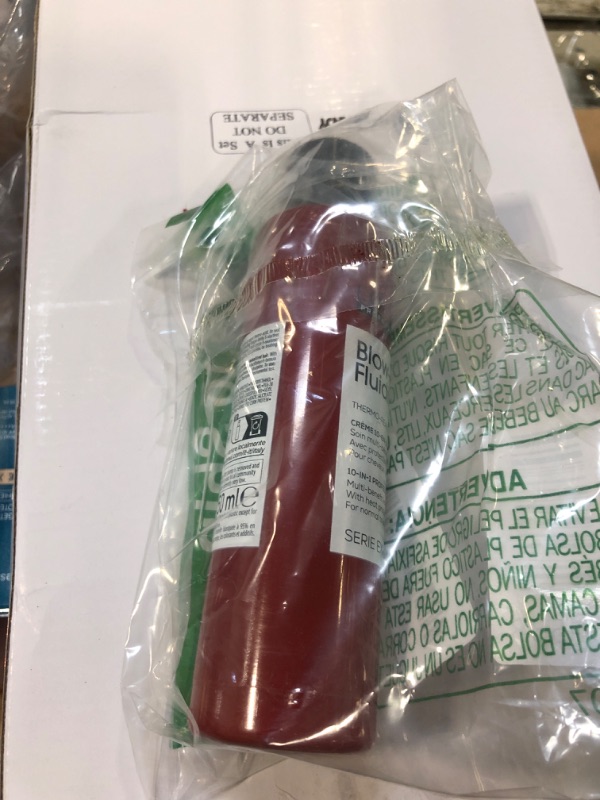 Photo 1 of **BROKEN**L'Oréal Professionnel Paris Fluidifier Heat Protectant - Multi-Benefit Leave-In Treatment For All Hair Types, Long-Lasting Blow-Dry and Frizz Protection