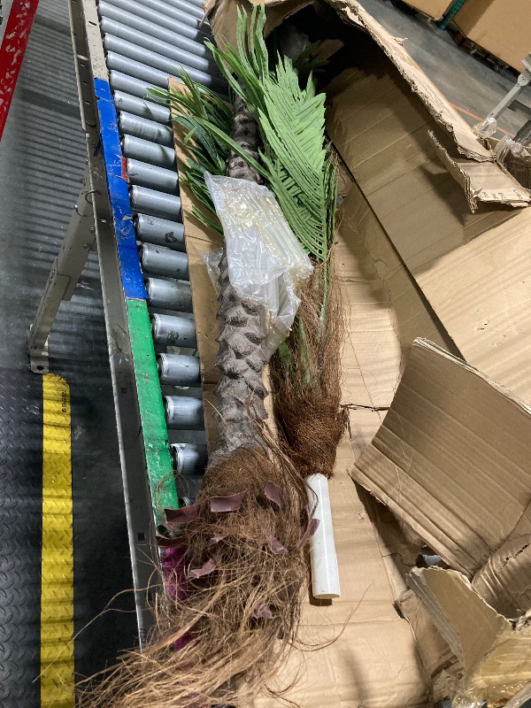 Photo 1 of ** USED*** Keeplush 8.5ft Tall Artificial Phoenix Palm Tree for Outdoors Indoor Decor, Large Faux Coconut Silk Palm Tree Tropical Fake Tree Perfect for Outside Patio Poolside Porch Home Office Decor