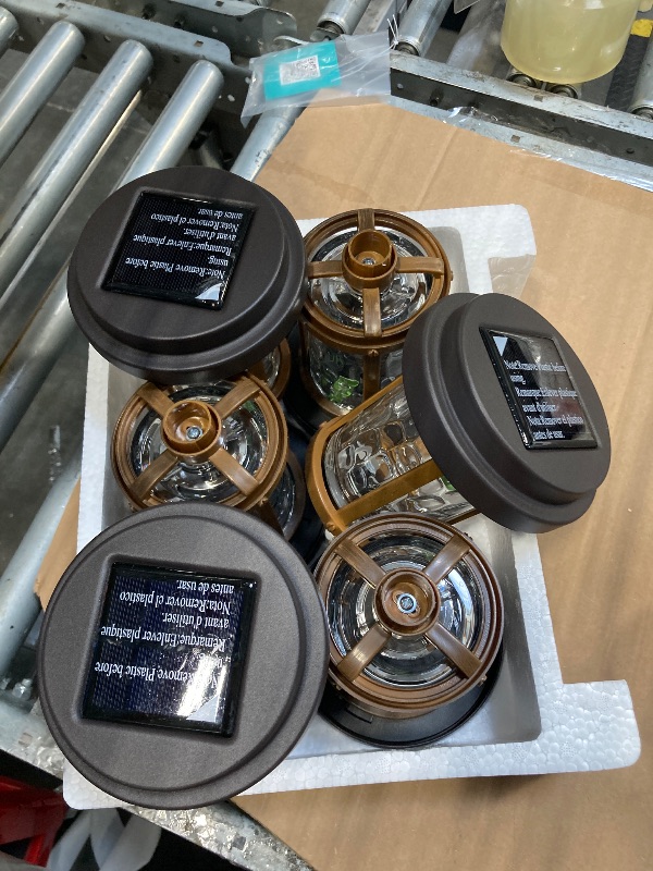 Photo 1 of ***** MISSING STICKS****  *** XMCOSY+ Solar Pathway Lights, Garden Solar Lights, 20 LM LED Glass Water Lens, IP65 Waterproof Solar Powered Light for Outside Driveway Walkway Landscape Backyard Sidewalk (?Black & Brown)