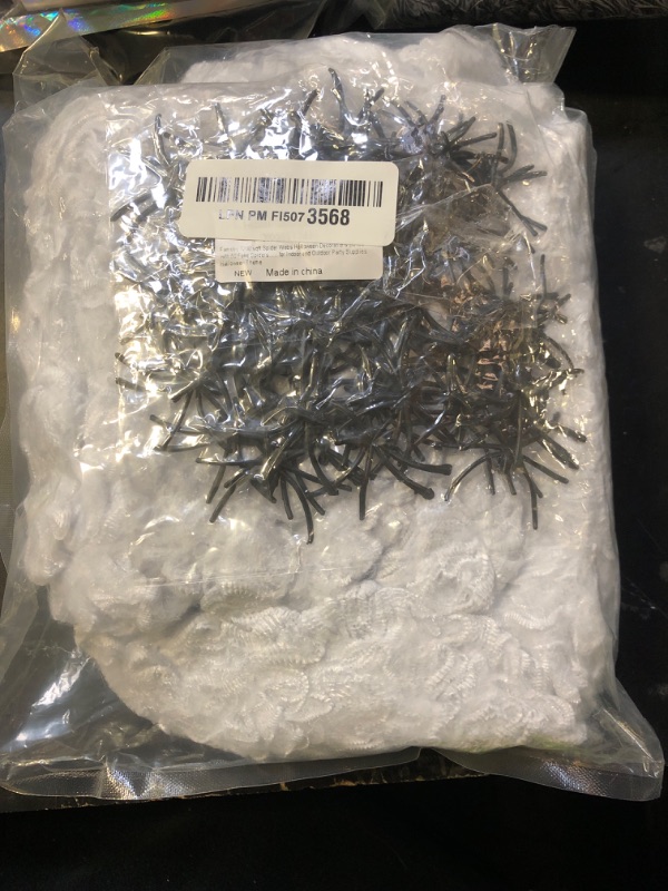 Photo 1 of 1200 sqft Halloween Spider Webs and 50pcs Fake Spiders Super Stretch Cobwebs Party Decorate for Halloween Theme Indoor and Outdoor Decoration