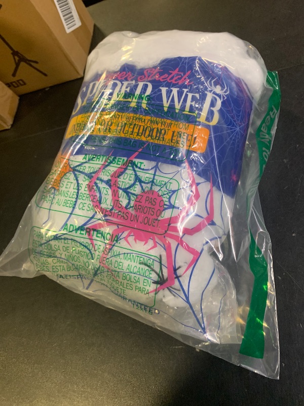 Photo 1 of 1000 sqft Spider Webs Halloween Decorations Bonus with 30 Fake Spiders, Super Stretch Cobwebs for Halloween Indoor and Outdoor Party Supplies