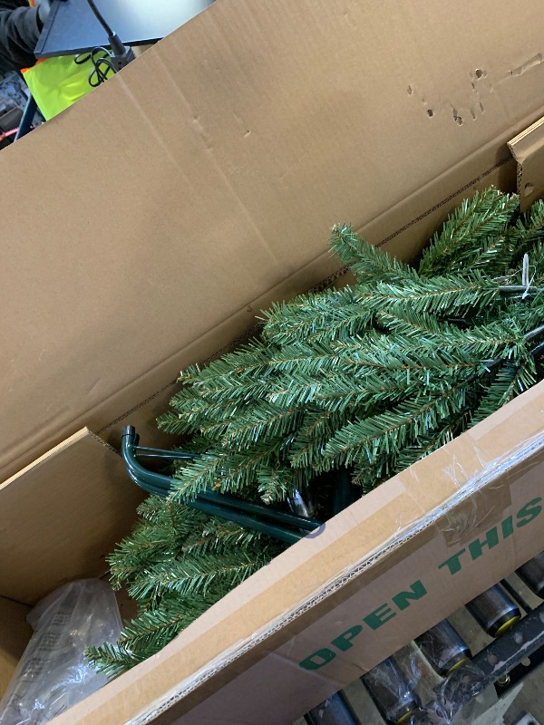 Photo 1 of ***No Lights** National Tree Company 4.5 ft Pre-Lit Kingswood Fir Slim Artificial Christmas Tree, 150 Clear Lights, 330 Tips, Includes Stand, Green