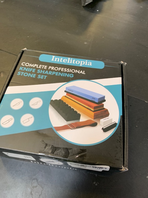 Photo 1 of Intelitopia Complete Knife Sharpening Stone Set – Dual Grit Whetstone 400/1000 3000/8000 Knife Sharpener with Leather Strop, Flattening Stone, Bamboo Base, 3 Non-slip Rubber Bases & Angle Guide