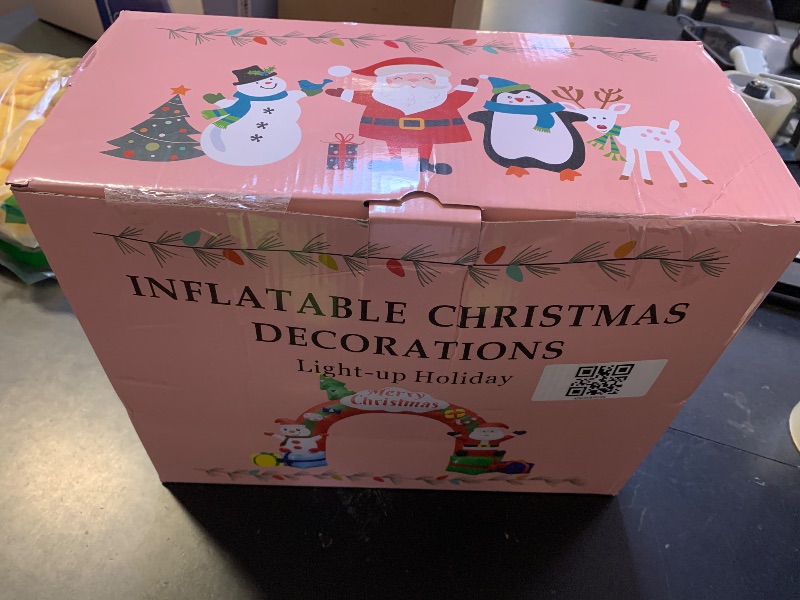 Photo 1 of 12.5FT Christmas Inflatables Archway, Inflatable Santa Claus and Snowman Sitting on Gift Boxes, Christmas Arch Blow Up Yard Decorations and LED Lights Built-in for Party Indoor, Outside, Garden, Lawn