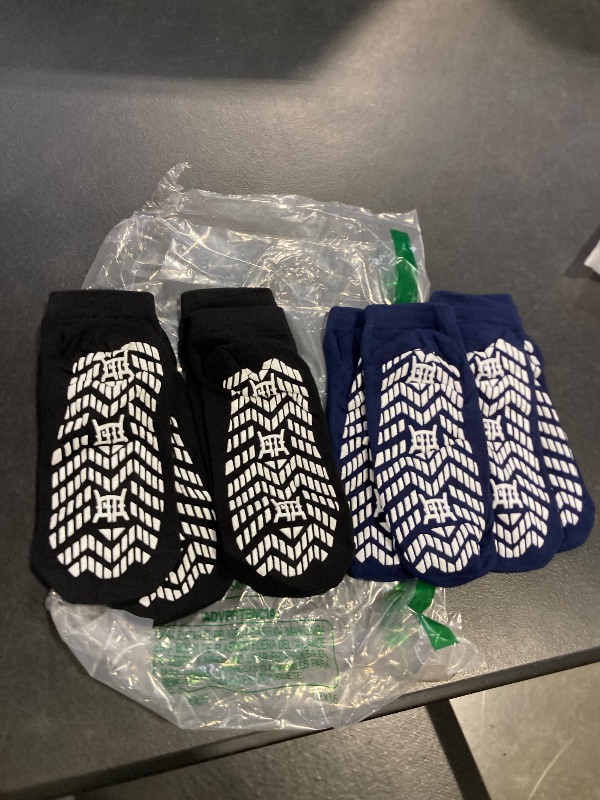 Photo 1 of 4 pairs of grip socks