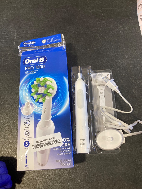 Photo 1 of Oral-B Pro 1000 Rechargeable Electric Toothbrush, White