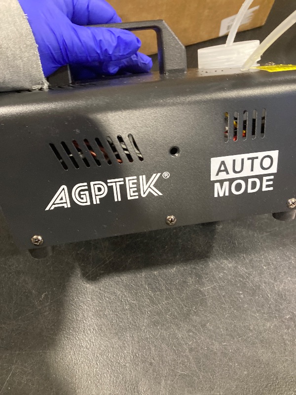 Photo 1 of AGPTEK Fog Machine, Smoke Machine with 13 Colorful LED Lights Effect, Auto Mode 4000CFM Fog with 1 Wired Receiver and 2 Wireless Remote Controls, Perfect for Wedding, Halloween, Party and Stage Effect
