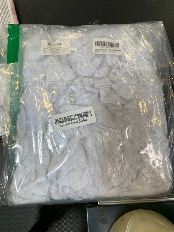 Photo 1 of 1000 sqft Spider Webs Halloween Decorations Bonus with 30 Fake Spiders, Super Stretch Cobwebs for Halloween Indoor and Outdoor Party Supplies