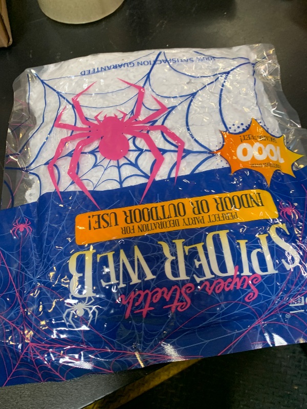 Photo 1 of 1000 sqft Spider Webs Halloween Decorations Bonus with 30 Fake Spiders, Super Stretch Cobwebs for Halloween Indoor and Outdoor Party Supplies