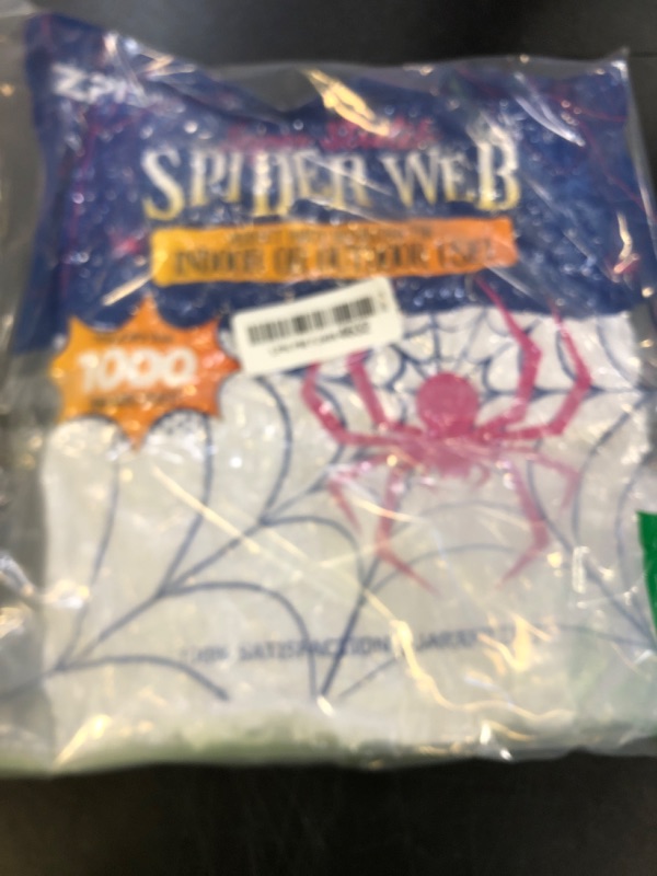 Photo 1 of 1000 sqft Spider Webs Halloween Decorations Bonus with 30 Fake Spiders, Super Stretch Cobwebs for Halloween Indoor and Outdoor Party Supplies