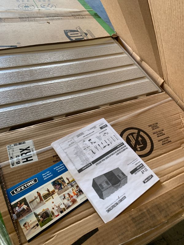 Photo 1 of *BOX 1,2 of 3* missing parts/partial set. SELLING FOR PARTS ONLY*______________

Lifetime Outdoor Storage Shed, 15x8 Ft, Desert Sand, Resin Backyard Tool Shed with Lockable Doors and UV-Protected Panels