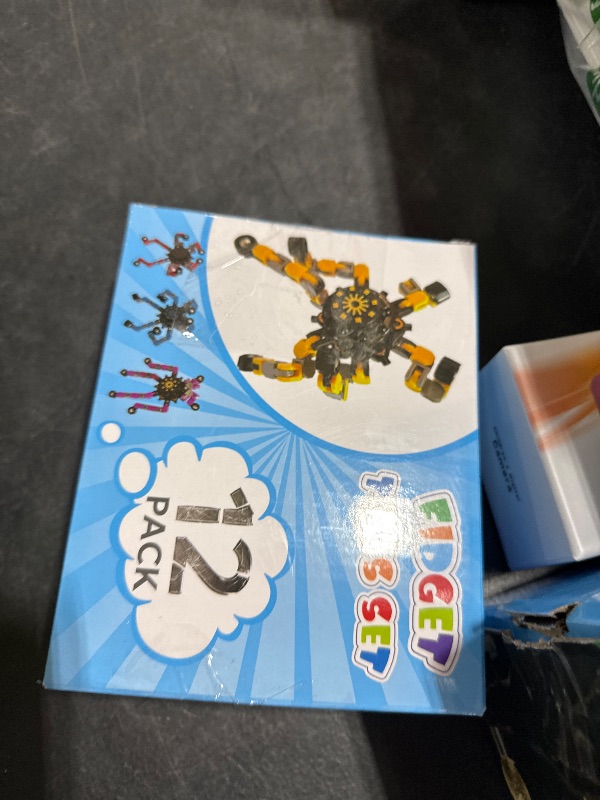 Photo 1 of 12 Pack Funny Sensory Fidget Toys,Deformable Chain DIY Robot Spinners Fingertip Stress Relief Gyro Toy Birthday Gifts Easter Basket Goodie Bag Stuffers Classroom Prizes Party Favors for Kids Adults