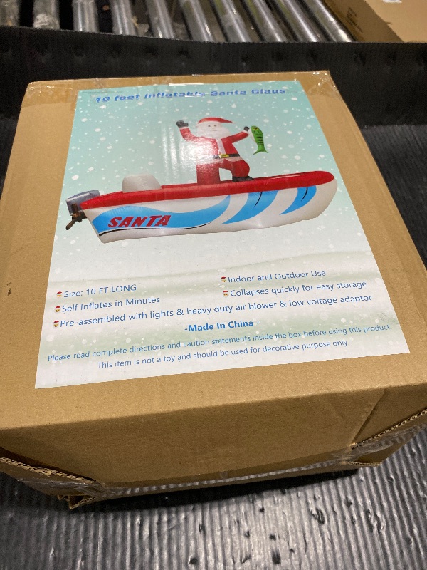 Photo 1 of 10FT Long Christmas Inflatable Santa Fishing on a Boat,Christmas Captain Santa Claus Outdoor Blow up Inflatable Santa Giant Garden Yard Lawn Decor