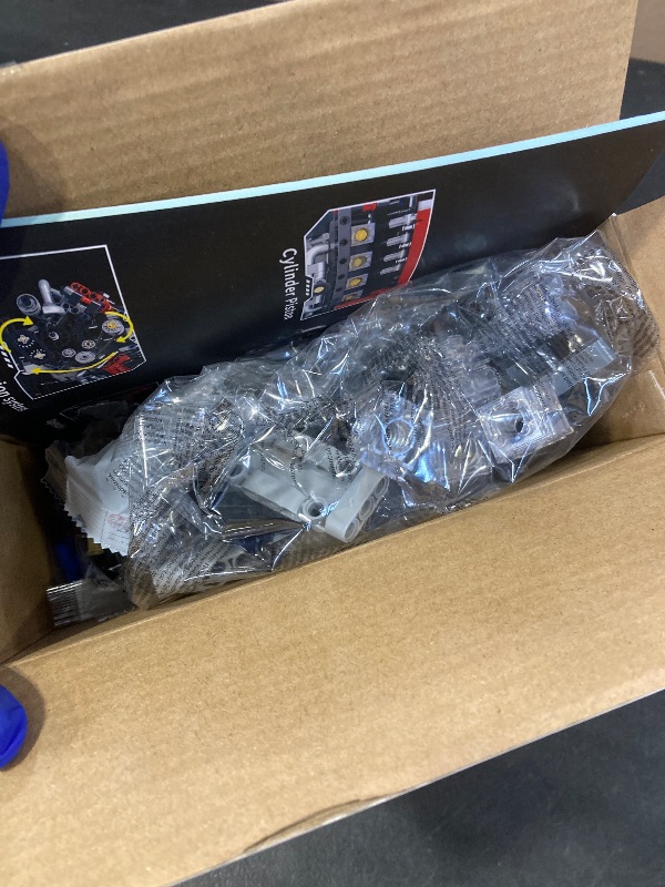 Photo 1 of Suplanet Mini V8 Engine Building Kit That Runs?Engine Building Blocks with LED Light for Adults, Visible Engine Model Set Construction STEM Toy for Kids Boys (660 PCS)