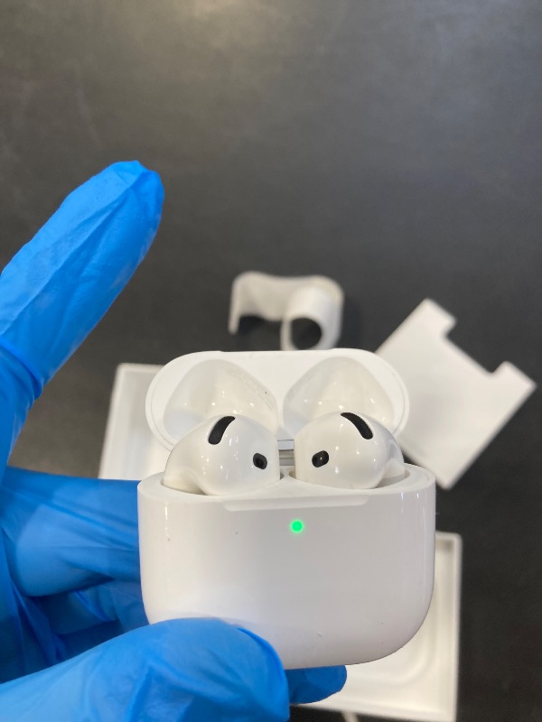 Photo 1 of Apple AirPods 4 Wireless Earbuds, Bluetooth Headphones, with Active Noise Cancellation, Adaptive, Transparency Mode, Personalized Spatial Audio, USB-C Charging Case, Wireless Charging, H2 Chip