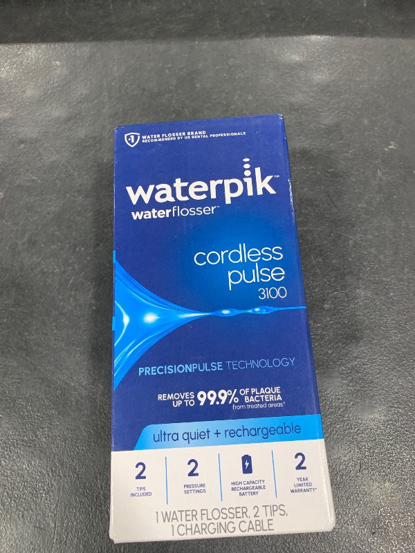 Photo 1 of Waterpik Cordless Pulse Rechargeable Portable Water Flosser for Teeth, Gums, Braces Care and Travel with 2 Flossing Tips, Waterproof for Shower Use, ADA Accepted, WF-20 Blue, Packaging May Vary