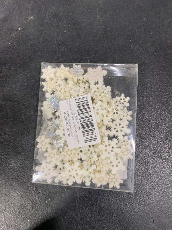 Photo 1 of 100Pcs Mini Snowflake Ornament Christmas Decorations- Glitter Resin White and Silver Snowflakes Christmas Craft Embellishment for DIY Craft Xmas Tree Winter Party Table Decor (3 Sizes)