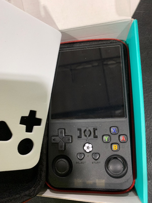 Photo 1 of ?R36MAX 4000mAh Portable Rechargeable Handheld Retro Game Console,Comfort Non-Slip Handheld Standing Retro Game Console with 64G TF Car,4.0-inch Screen,for Office,Black