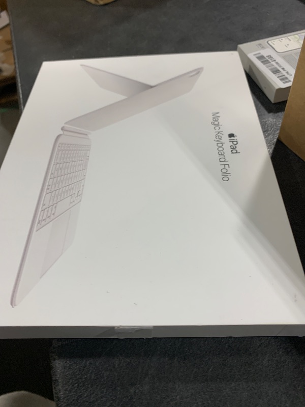 Photo 1 of Apple Magic Keyboard Folio: iPad Keyboard and case for iPad (A16 and 10th Generation), Detachable Two-Piece Design That attaches magnetically, Built-in trackpad, US English – White