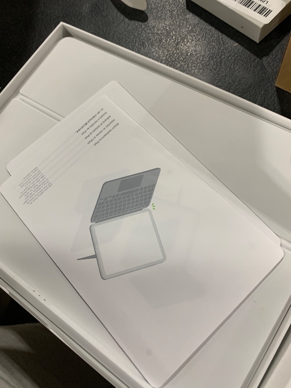 Photo 1 of Apple Magic Keyboard Folio: iPad Keyboard and case for iPad (A16 and 10th Generation), Detachable Two-Piece Design That attaches magnetically, Built-in trackpad, US English – White