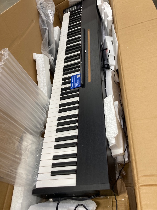 Photo 1 of ***(PARTS ONLYT-SELLING AS IS )*** Donner DDP-50 LITE 88-Key Weighted Digital Piano for Beginners, Full Size Electric Piano with Music Stand, Power Adapter, Sustain Pedal, Built-in Lessons, 1000 Tones & Rhythms, Black`