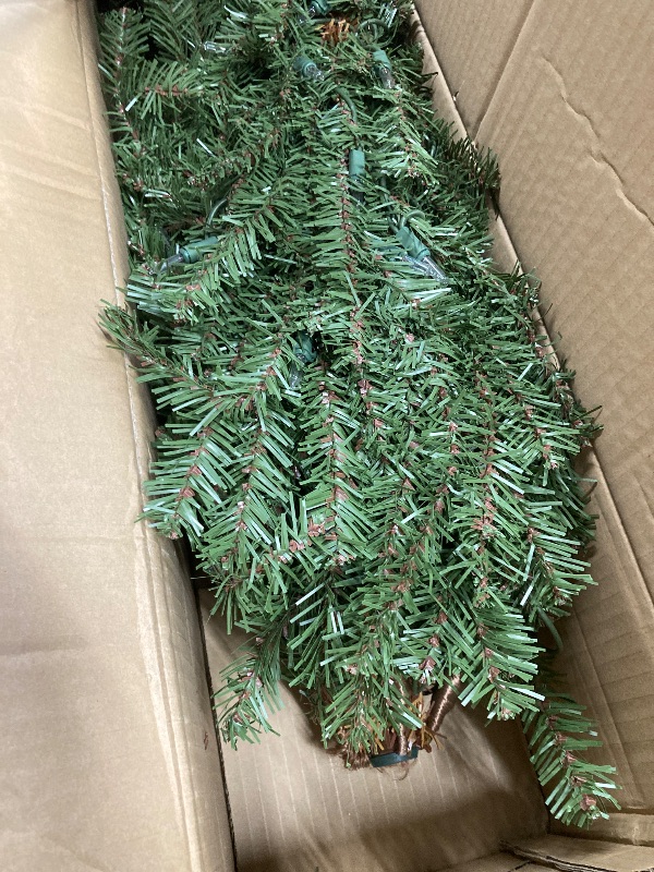 Photo 1 of ***SOME OF THE LIGHTS DO NOT WORK***Puleo International Pre-Lit 4' Alpine Artificial Christmas Tree with 100 Lights, Green***SOME OF THE LIGHTS DO NOT WORK***