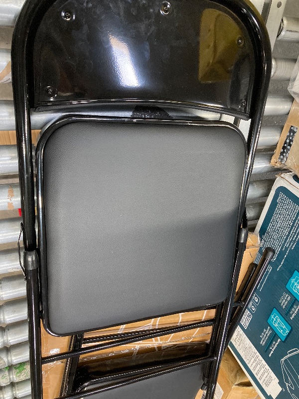 Photo 1 of **ONE CHAIR IS DAMAGE FROM BOX CUTTER-SEE PIC**CONCETTA 2 Pack Sturdy Metal Folding Chair with 350-Pound Capacity, Metal Frame, Water-Resistant, Ideal for Indoor and Outdoor Events, Black